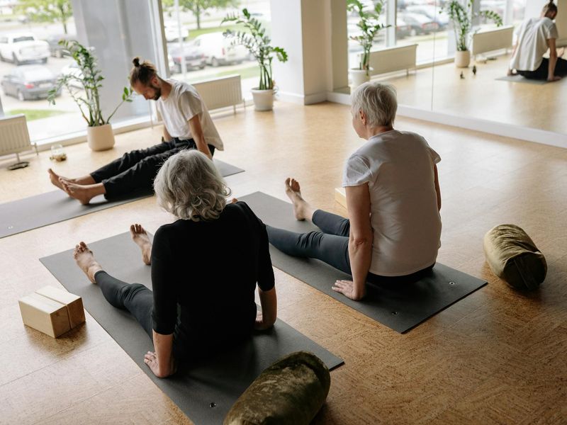 Atmospheric photo of a yoga studio with soft lime lighting